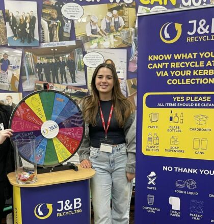 Promotional stand for J&B Recycling with roll out banners and a game to educate about recycling