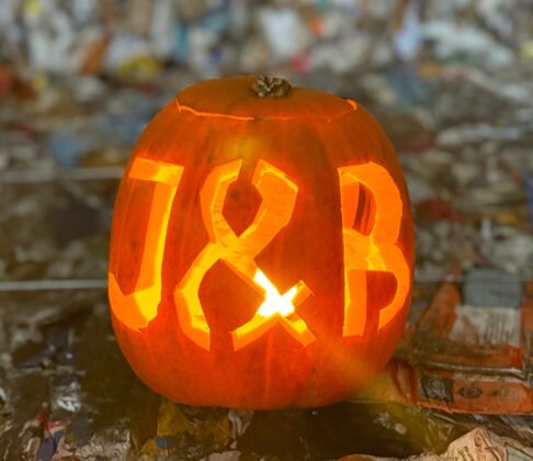 Halloween pumpkin with J and B letters glowing